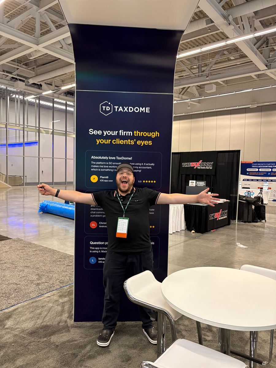Yehuda at the TaxDome booth